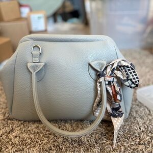 Elegant Light Gray Leather Dome Handbag with Scarf Accent